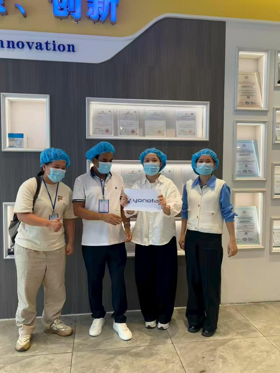 Yonota representatives visiting a feminine care manufacturing facility